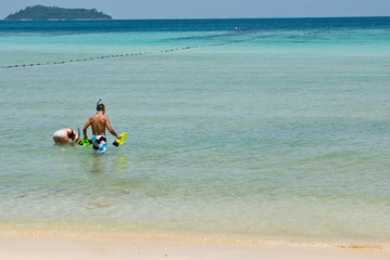 A young couple out scuba diving