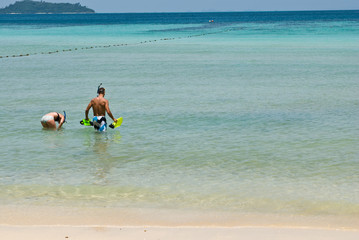 A young couple out scuba diving