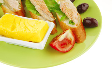 salmon pieces on baguette slices