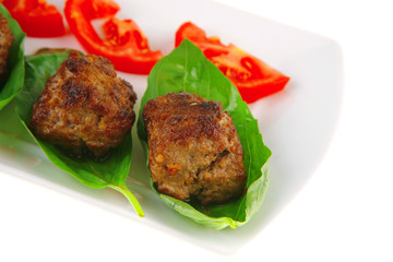 roasted beef cutlets on white