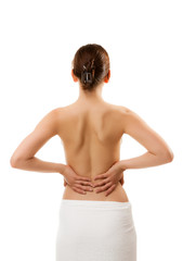 Naklejka premium Woman massaging pain back isolated on white