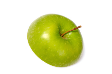 fresh green apple cut into slices. isolated on white background