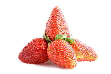 Few strawberries isolated on white