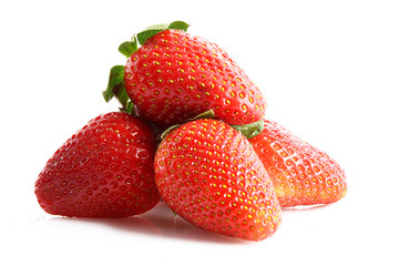 Few strawberries isolated on white