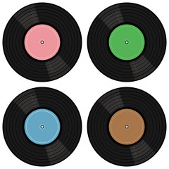 four vinyl records on white background