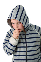 Small boy coughing in a hood isolated on white