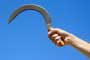 sickle in hand