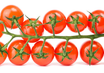 Cluster of cherry tomatoes on the white