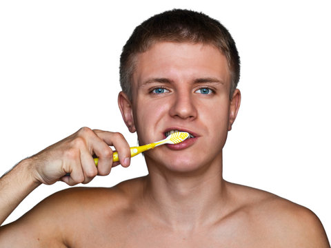 A Guy Brushing His Teeth