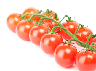 Cluster of cherry tomatoes on the white