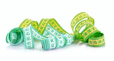 Multicoloured  measuring tapes  isolated on white