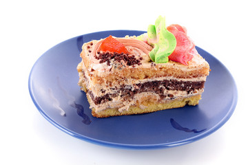 sweet cake on blue plate