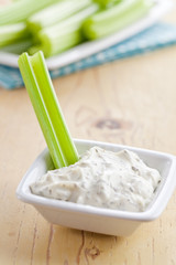green celery sticks with tasty dip