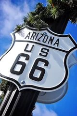 Washable wall murals Route 66 A Route 66 road sign pole with Christmas decorations in Arizona.