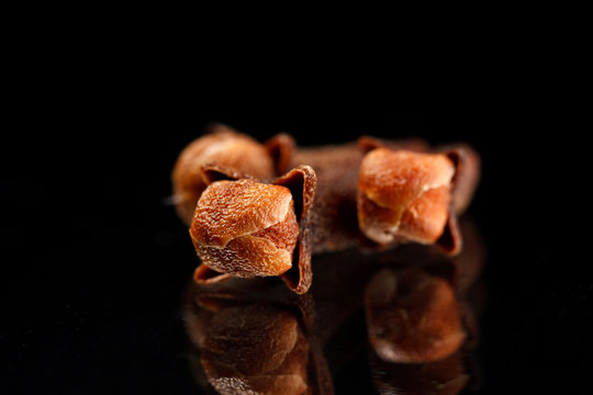Cloves on black background
