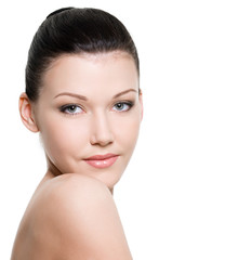 Fototapeta premium female face of young woman with clean skin - isolated