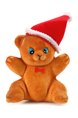 toy bear in the hat of santa claus