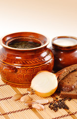 rustic food, soup in a clay pot