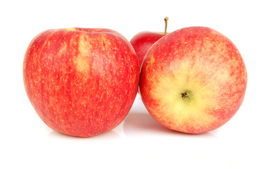 Three red apples isolated.