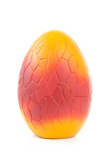 colorful plastic egg toy over white background