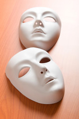 Theatre concept with the white plastic masks