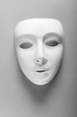 Theatre concept with the white plastic masks