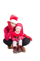 Santa mother and daughter in studio