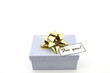 blue box with gold bow and 'for you' tag isolated on white