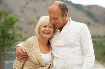 Middle-aged couple outdoors