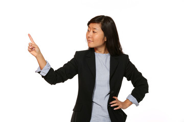 Obraz premium Woman pointing over white background with copy space