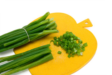 Cut green onion isolated on the white background
