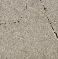 split crack in grungy stone