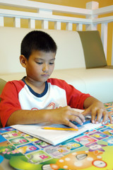 Boy with schoolwork