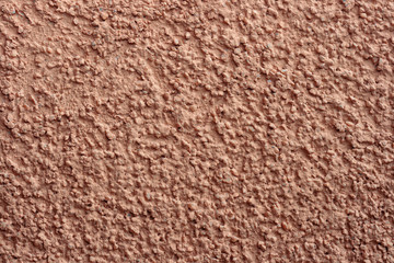 Red colored plaster wall background