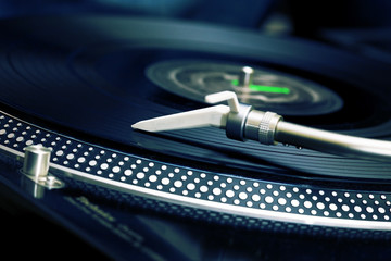 Turntable playing vinyl record