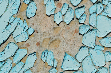 cracked surface of blue paint