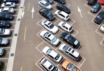 Aerial of a parking house full of cars - obrazy, fototapety, plakaty