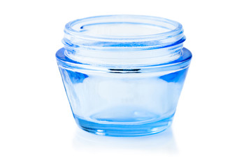 Open blue glass empty cosmetic container