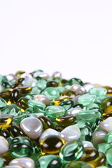 Colorful decorative stones in close up with space for text