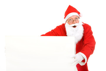 amazed santa claus with big blank card