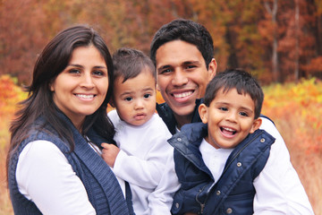 Happy family smiling autumn portrait