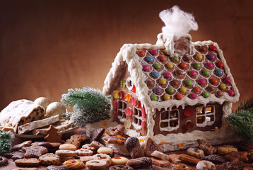 Homemade gingerbread house and christmas cakes