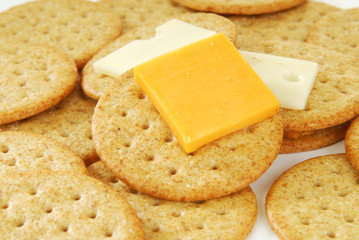Cheddar cheese on a cracker