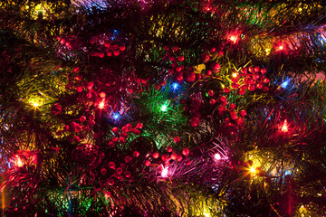 Obraz na płótnie Canvas Glittering LED Christmas Lights on a Decorated Christmas Tree