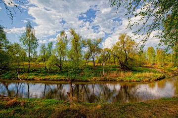Fototapeta premium Early autumn rural landscape with river