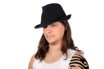 Man with fedora looking serious