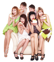 Group of happy young people with cake.