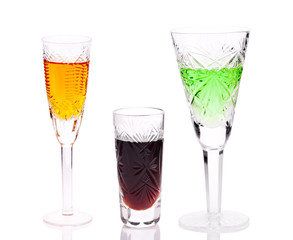 three glasses with different drinks