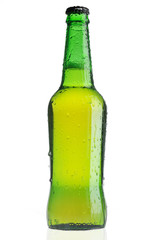 Green beer bottle with water drops on white background