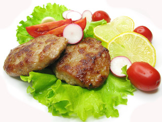cooked meat cutlets with vegetables